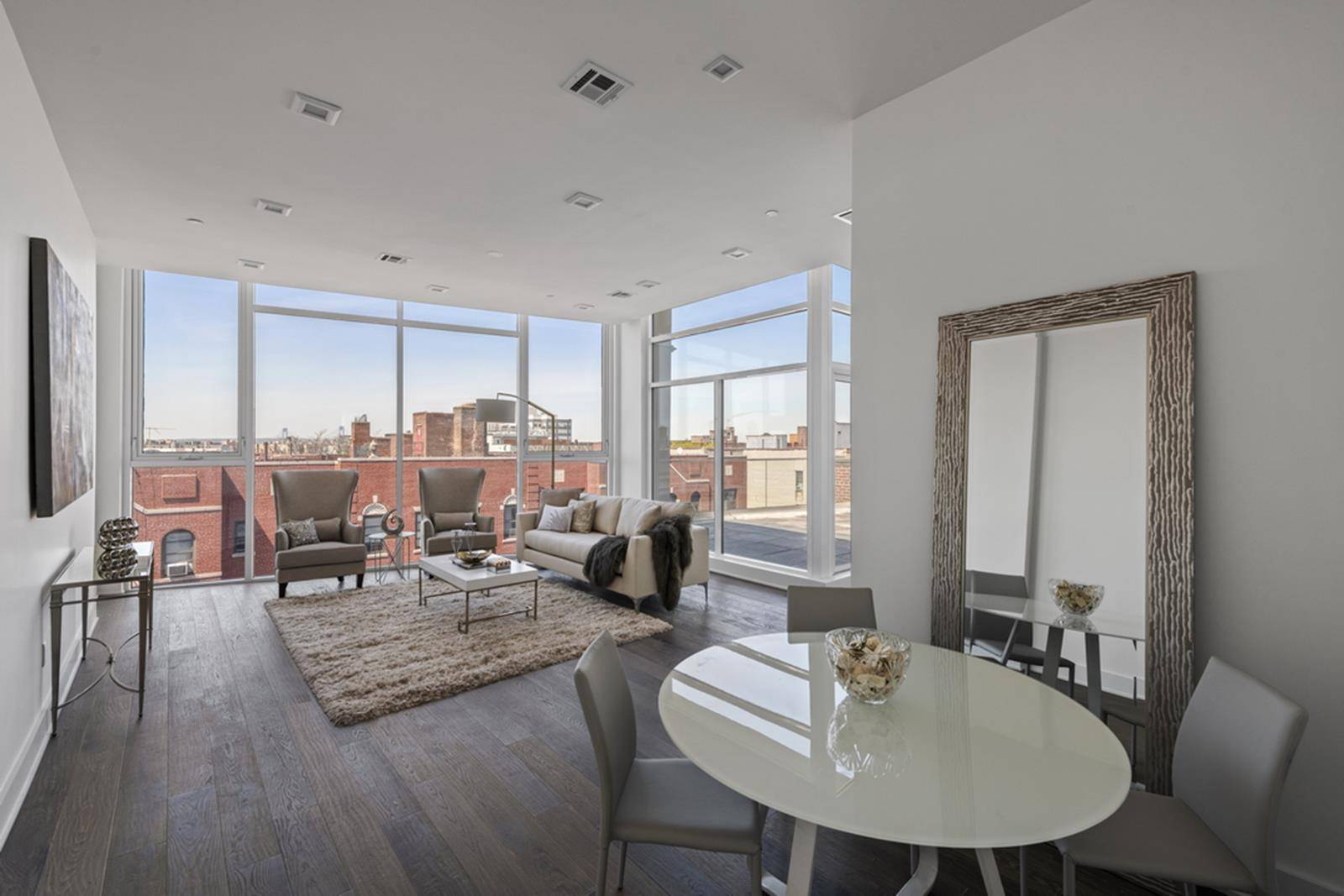 A sublime floor through penthouse graced with a trio of private outdoor spaces, this 3 bedroom, 2.