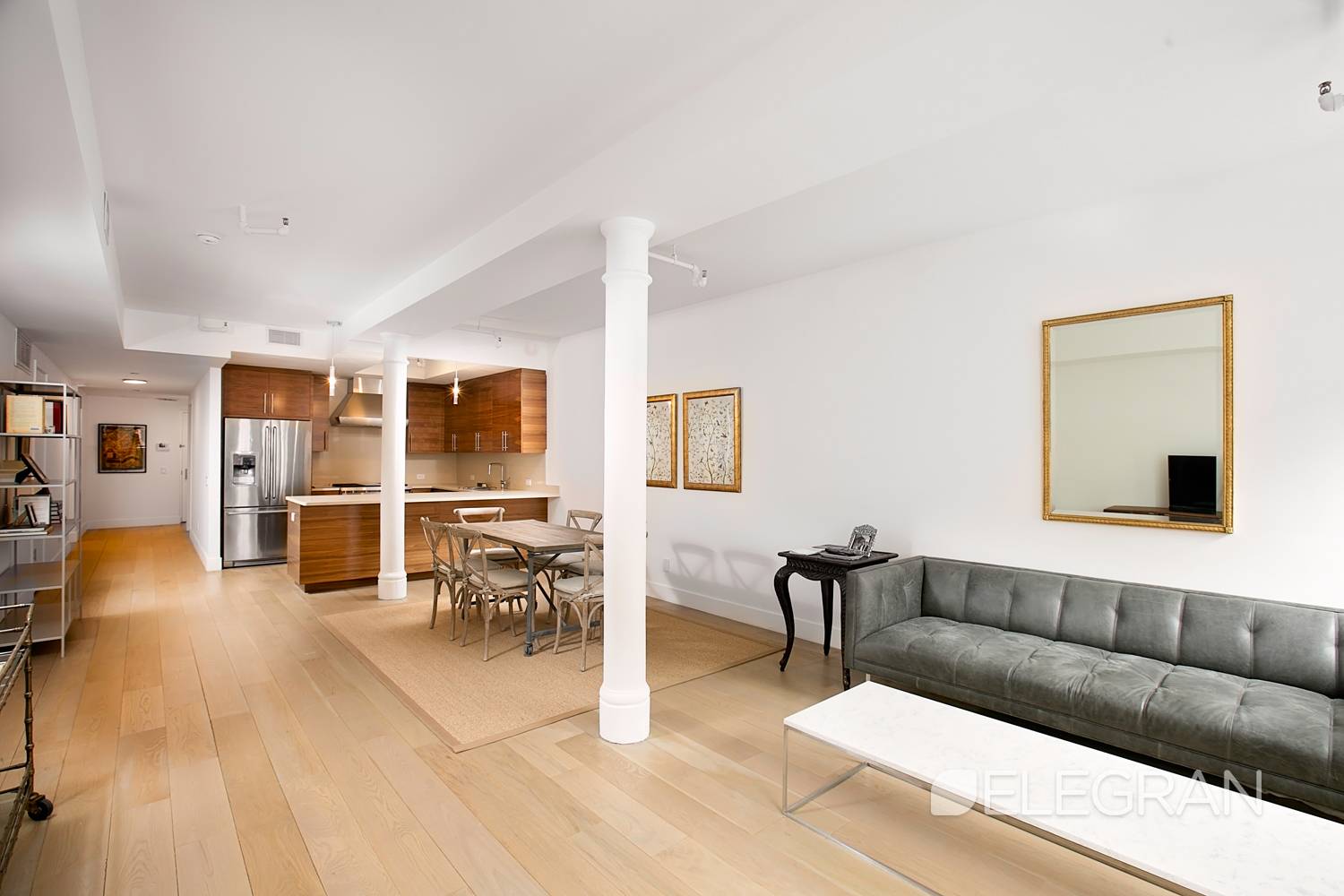 Amazing opportunity to own a competitively priced three bedroom, two full bathroom loft residence at 133 Mulberry, a building that blends contemporary luxury with timeless elegance.