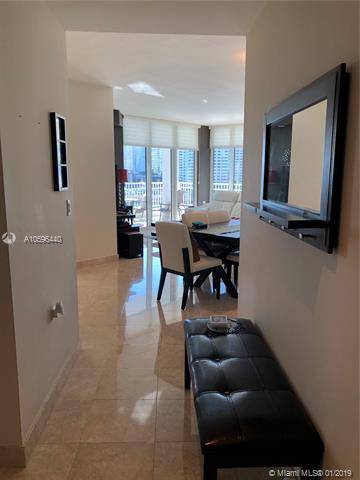 Stunning corner unit with amazing water and city views in high end prestigious Brickell Key