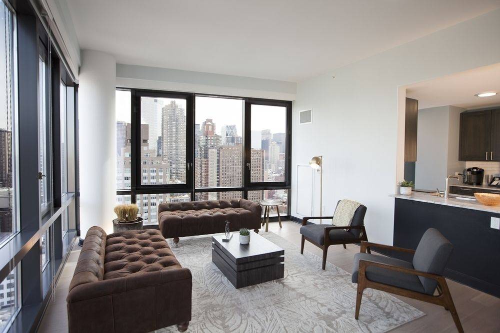 2bed/2bath HighRise Corner Unit Available for Immediate Move In! No Fee! Floor to Ceiling Windows and Impecabble City Views. Call Agent David for a Private Viewing at (646) 243-2958.
