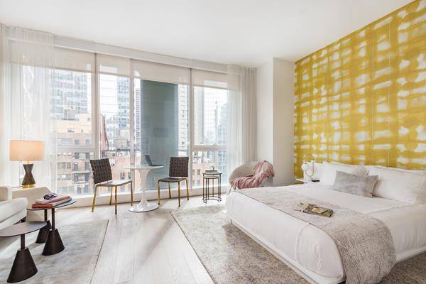 Step within the threshold of your luxurious ARO studio residence into an inviting sanctuary of contemporary design in what is currently the best rental building in NYC.