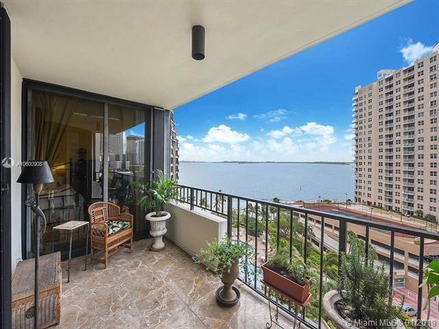 Take in spectacular panoramic views of Biscayne Bay from the 10th floor of Brickell Key One