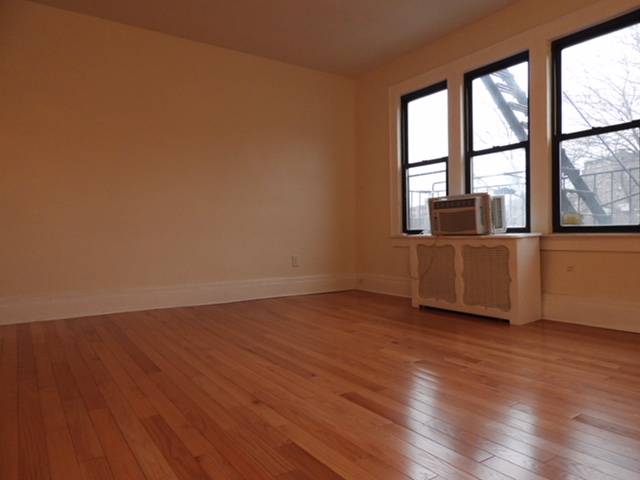 Massive 2 Bedroom 1 Bathroom Apartment Rental In Multi Family House Just a Block Away From The LIRR Kew Gardens Spot!
