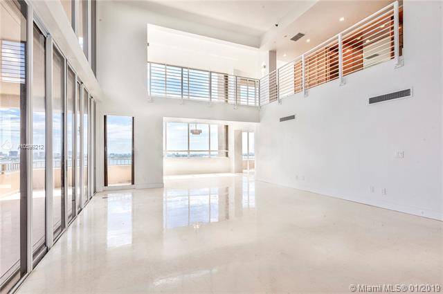Unique Waterfront Two Story PENTHOUSE at Jockey Club III with close to 5500 sq