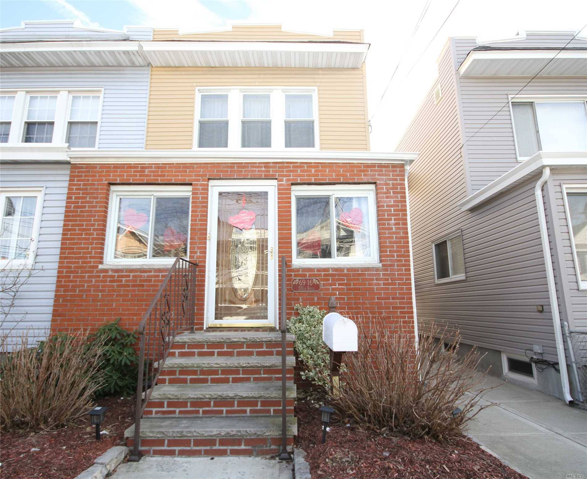 Beautiful Single Family Home In A Great Maspeth Location; Semi-Detached, Spacious And In Excellent Condition.