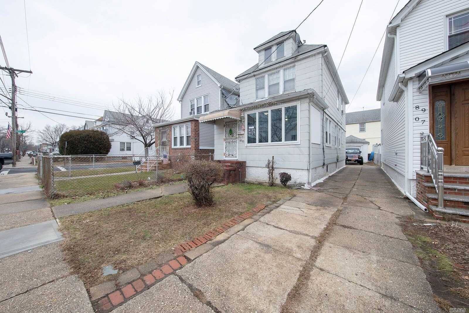 Beautiful Colonial House At A Convenient Location In Bellerose Featuring 3 Bedrooms 2 Bath.