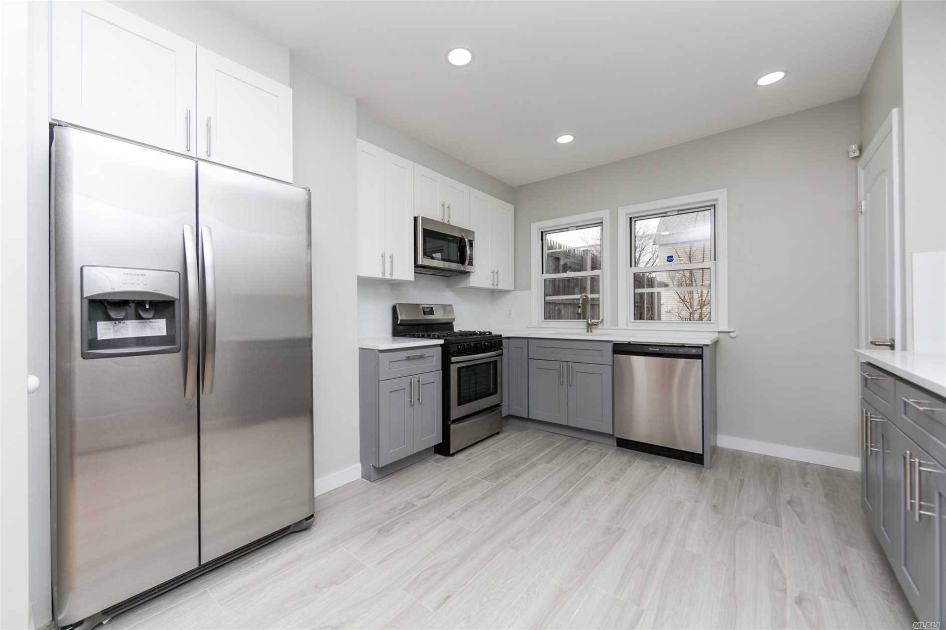 Space And Style Come Together In This Luxuriously Renovated Fully Detached 1 Family Nestled On A Beautiful Tree Lined Street Of South Ozone Park!