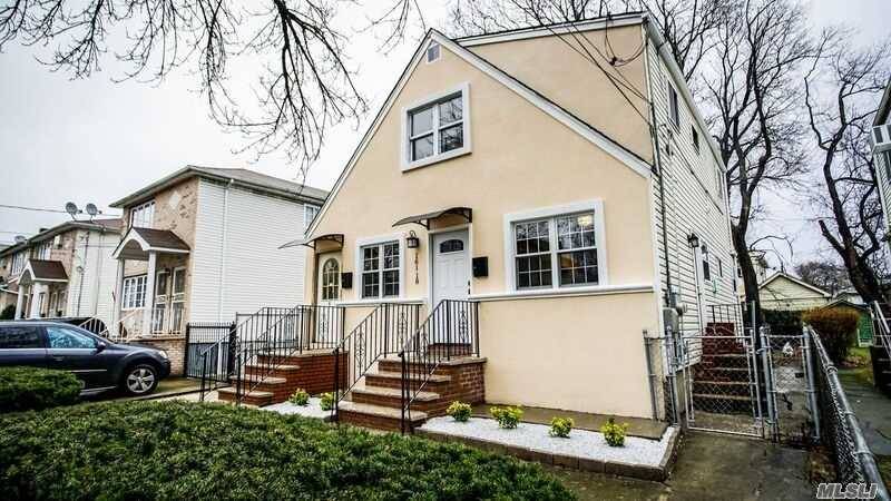 Beautiful Renovated Two Family House Nestled On A Tree Lined Street.