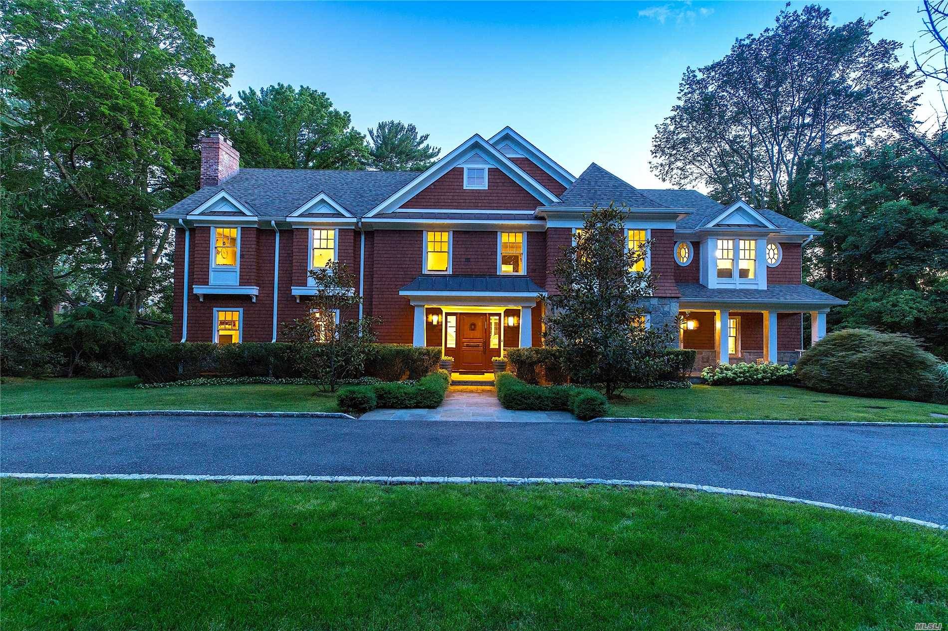 Welcome To This Stunning Stone And Shingle Colonial Home, With Winter Water Views, Situated On Almost 1 Acre Of Property In The Heart Of Prestigious Great Neck Estates.