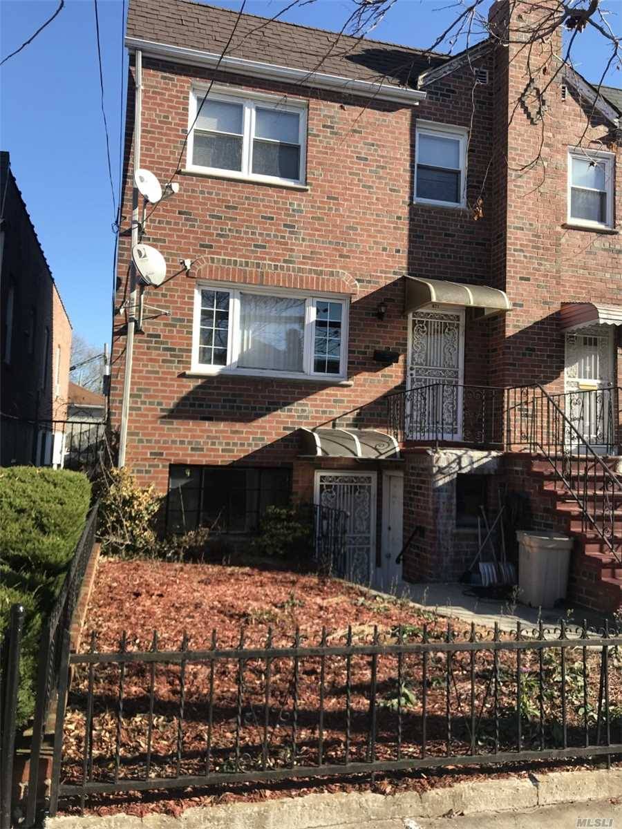 Spacious Two Family In East Flatbush Area, Owner Will Enjoy Three Bedroom Duplex With A Renovated And Updated Bathroom, Hardwood Floors Thru Out.