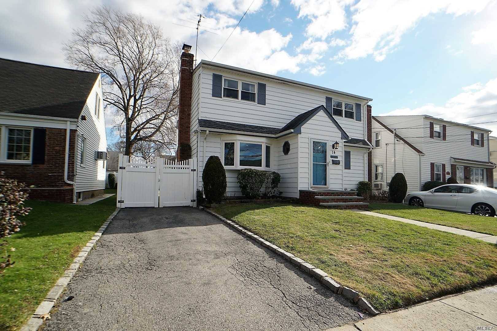 Generously Sized 2 Story Beautiful Colonial Featuring A Full Finished Basement, 3 Bedrooms And 1.