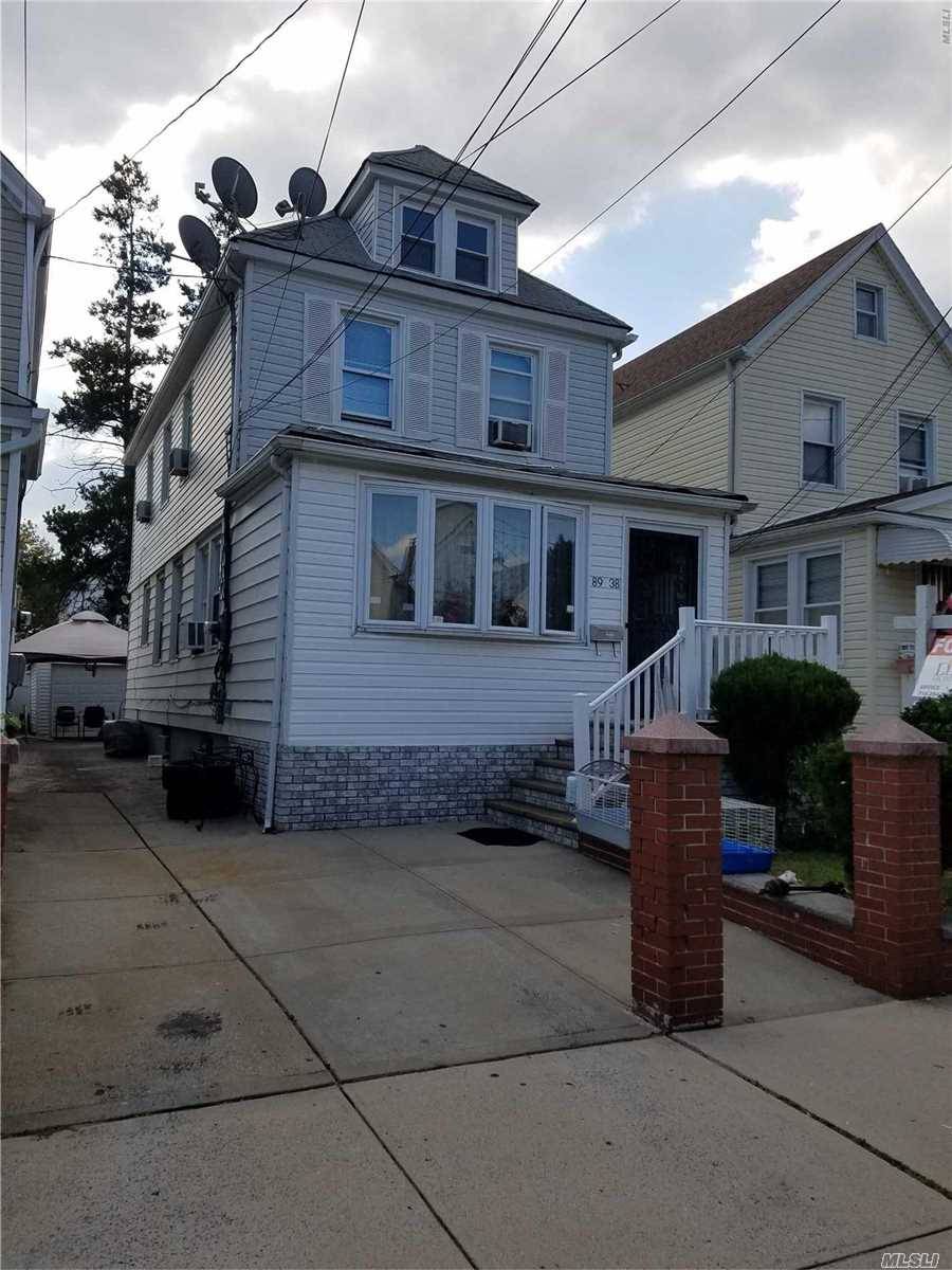 A Charming Single Family Home, With 3 Bedrooms, 2 Baths, Modern Kitchen, Upgraded Boiler, Large Back Yard With 1 Car Garage, New Water Filtering System !