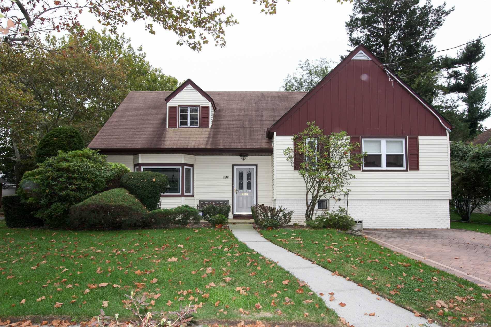 Beautiful Split Level Home In Mint Condition On An Oversized Corner Lot.