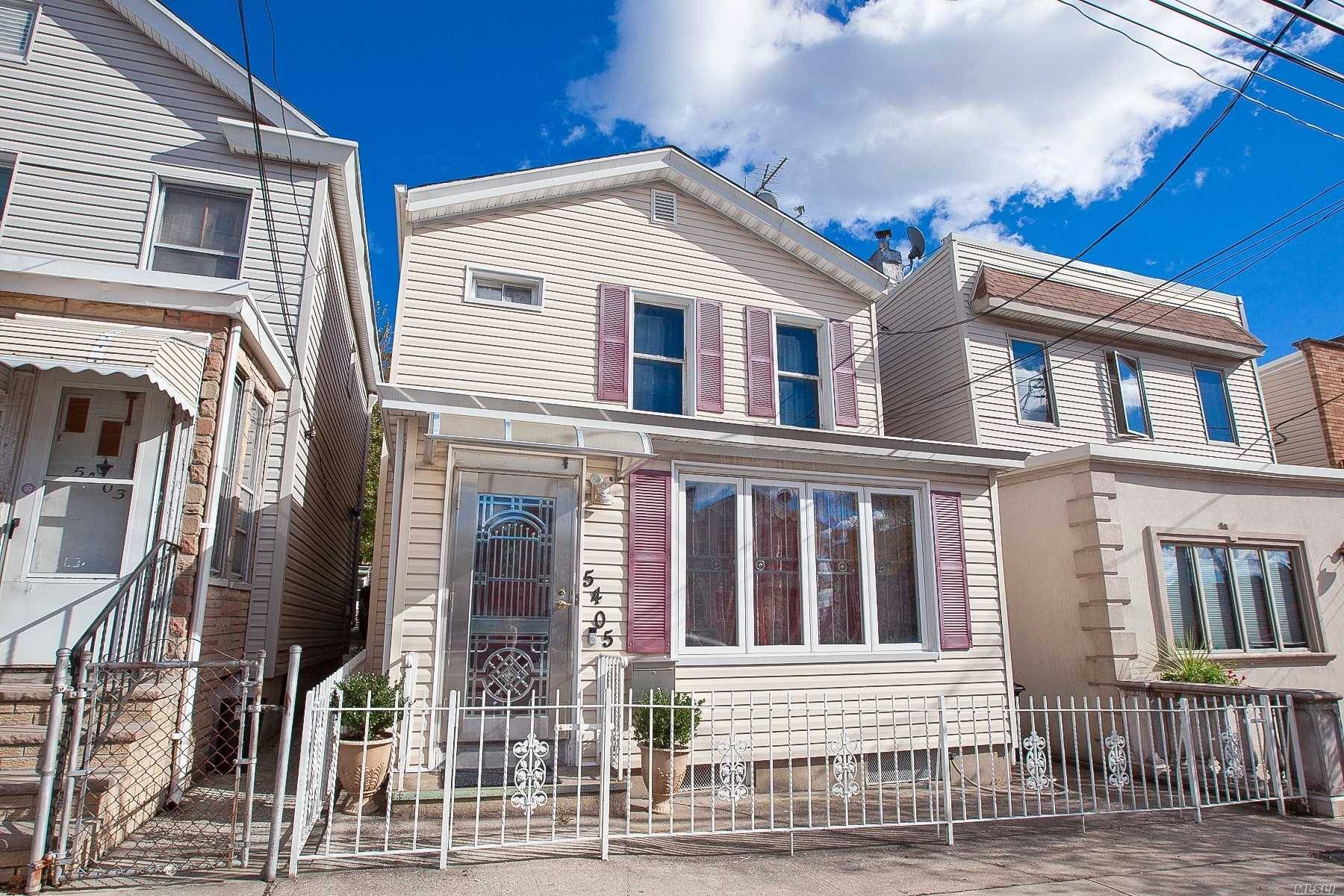 Beautifully Well Maintained Detach R4 Zoned Property In The Heart Of Maspeth.
