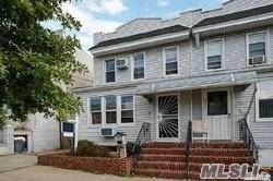 Enjoy Living In This 2Family Home Located On The Refined Streets Of Maspeth !