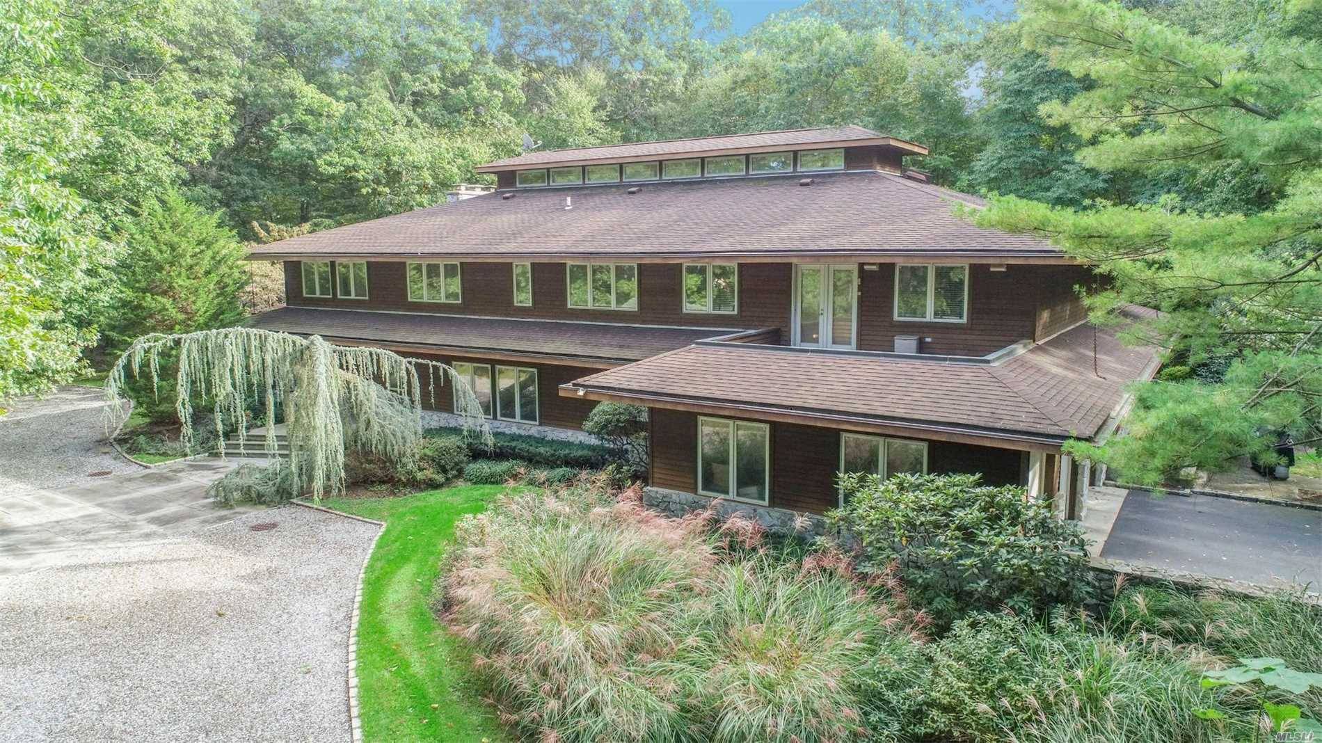 This Frank Lloyd Wright Inspired Residence w 6200 sq ft.
