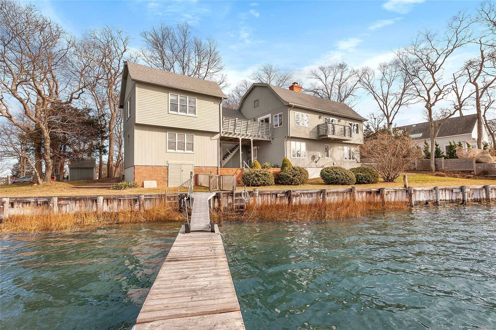 Tucked Away, Minutes From Sag Harbor Village, Rests A Magnificent Waterfront Opportunity.