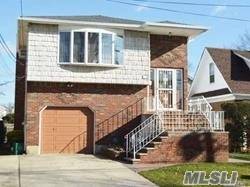 Spacious And Lovely Hi Ranch With Full Basement .