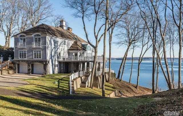 Spectacular Waterfront Residence Set On 2 Beautiful Acres With Direct Access To The Water.