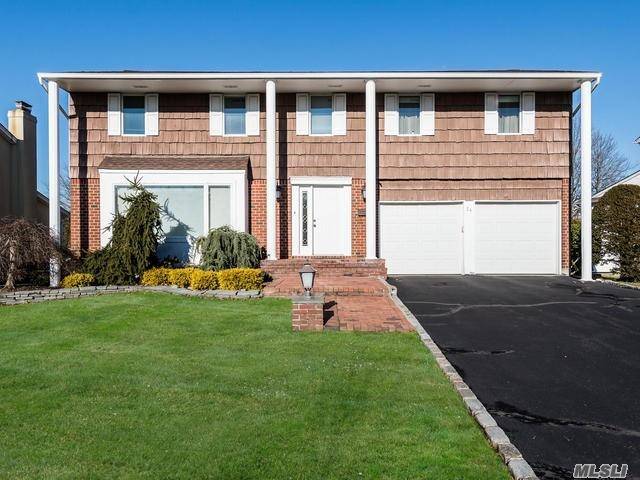 Priced To Sell ! This 4 5Bdrm Colonial Features An Open Floor Plan W Gleaming Hwfloors, Eik W Wood Cabinetry, Sparkling Granite Counters, Painted Tiles Breakfast Nook.