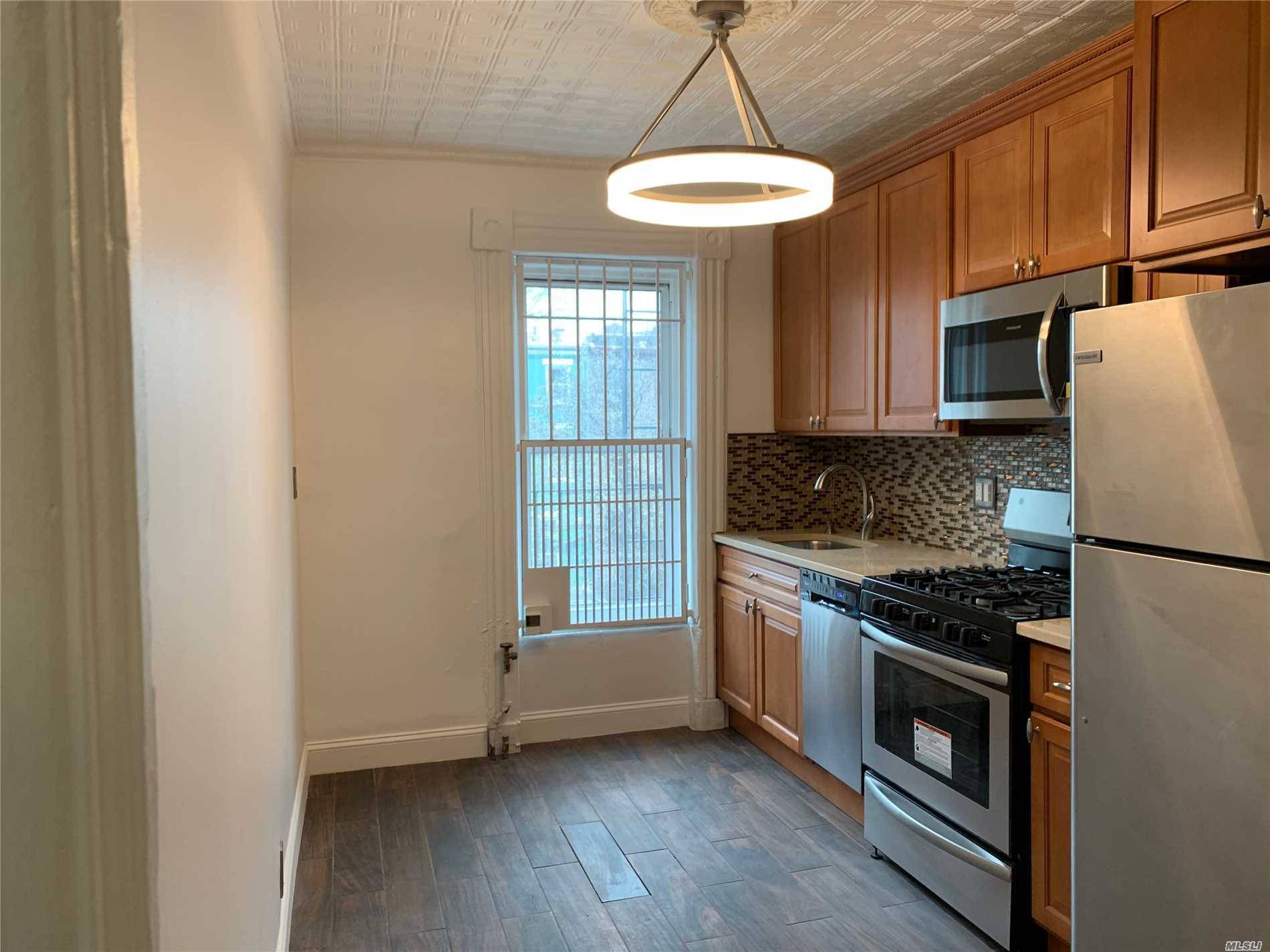 This Spacious 3 Bedroom Is The Entire Floor Of A Well-Maintained Brownstone.