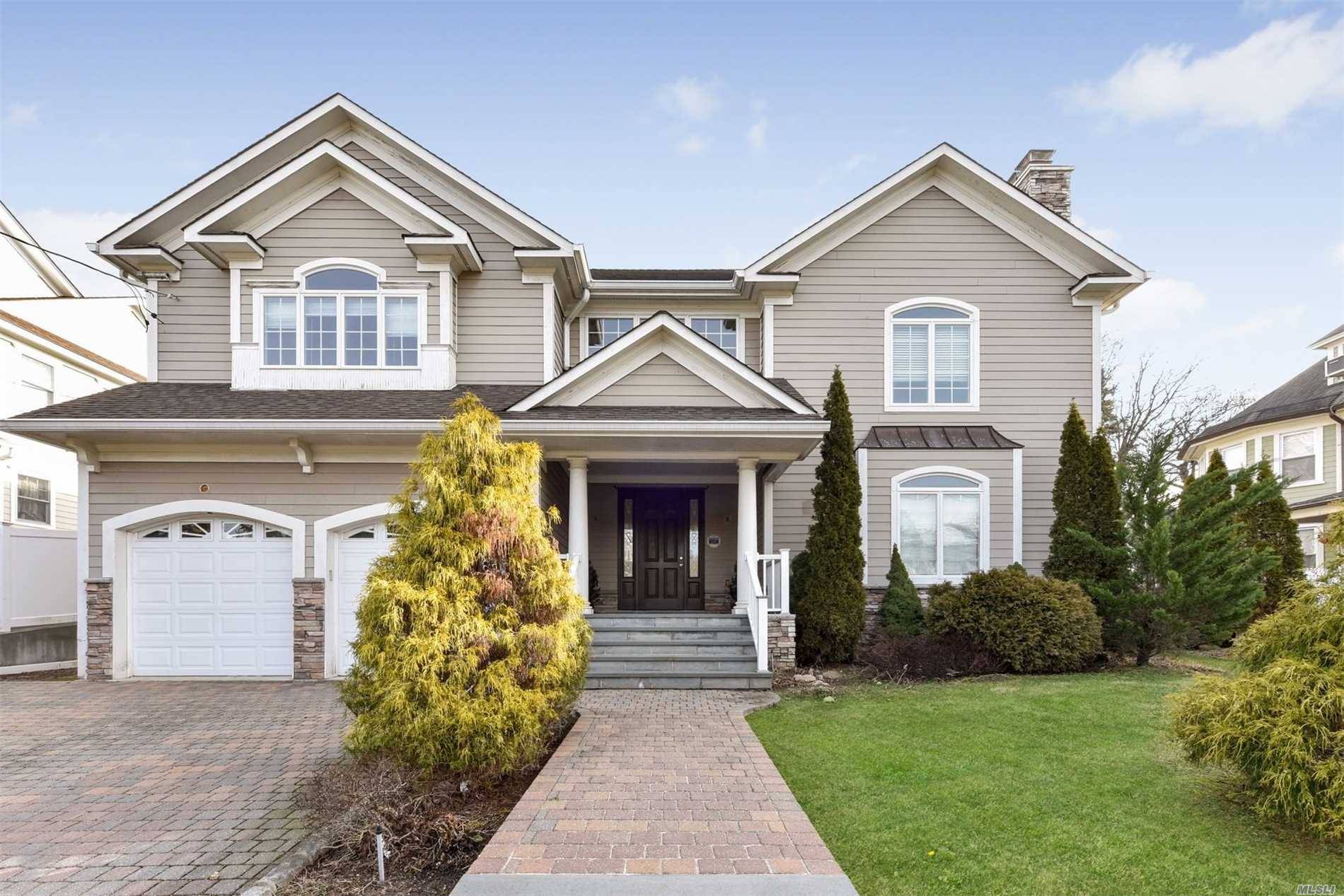 Curb Appeal Abounds In This Huge Colonial !