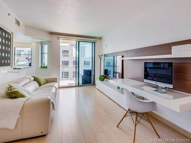 Live at The Cosmopolitan South Beach with a stunning view of the ocean in this 1 bed and 1
