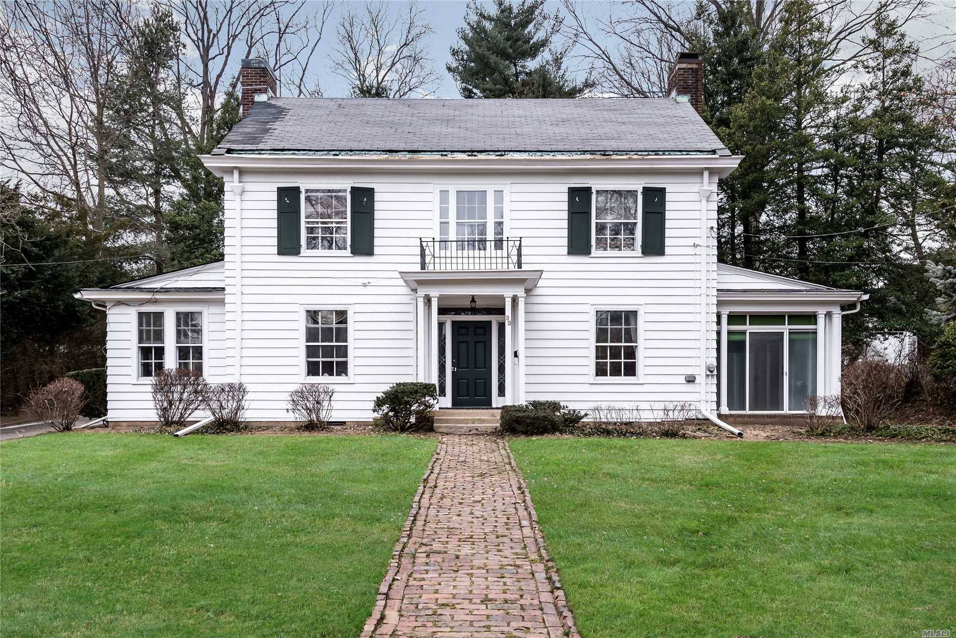 This Colonial Offers 3 Bedrooms, 2.