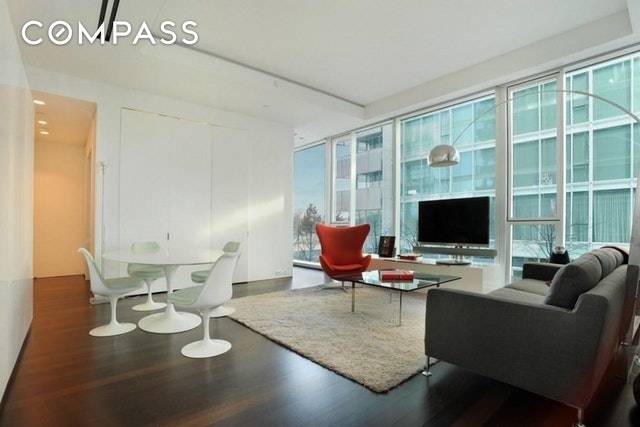 This gracious studio is a rarely available apartment in an exceptional, Richard Meier designed West Village building ; with high ceilings, dark stained wenge hardwood floors, and floor to ceiling ...