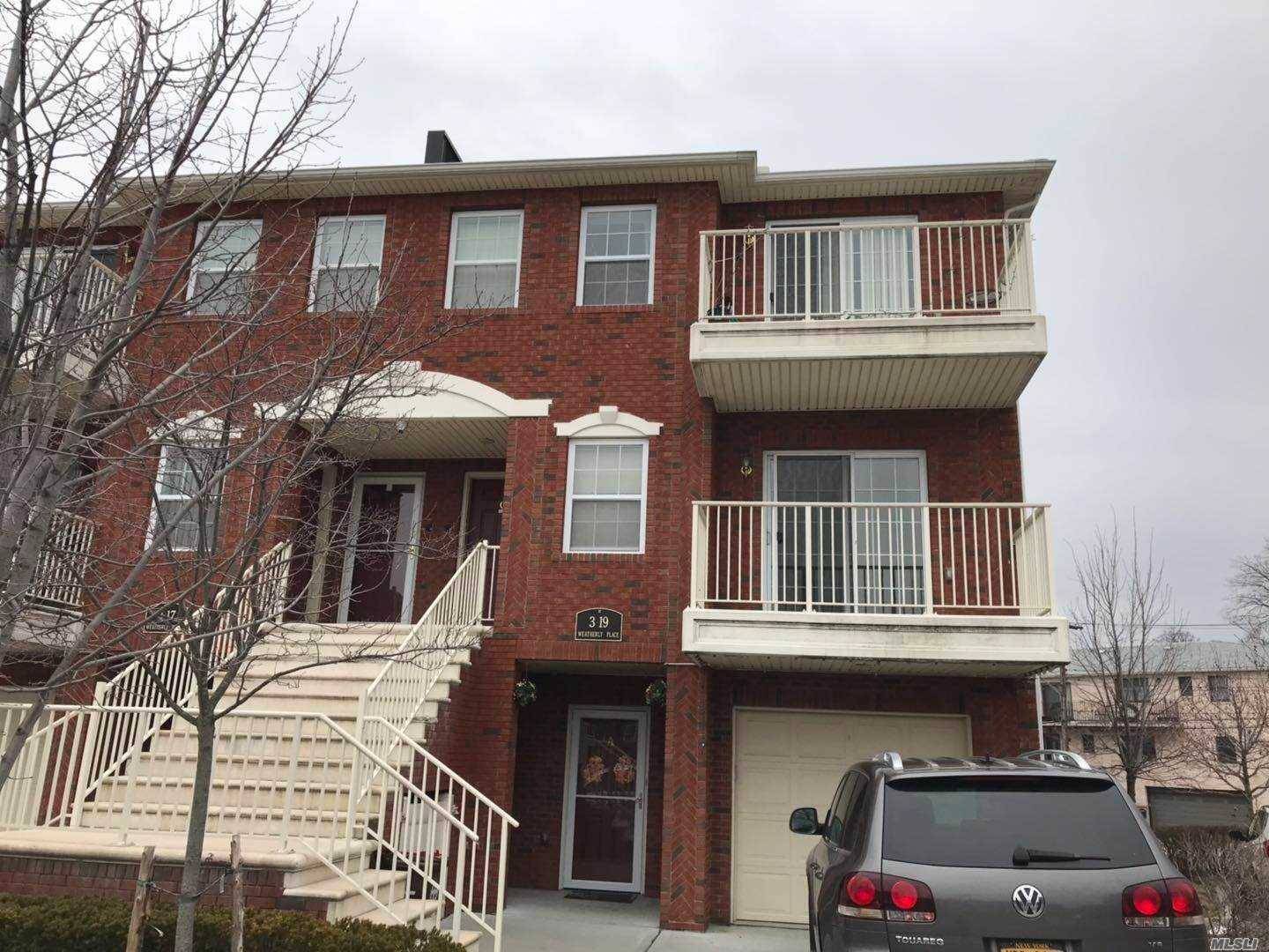 this in 2nd Floor corner unit has a lot of windows very bright beautiful like new 2 Bedroom, 2 Bath, Kitchen, Lr Dr Balcony Condo In College Point.