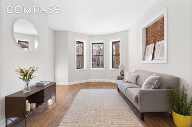 Renovated two family home in the Brooklyn College area of Brooklyn featuring exquisitely designed modern interiors.