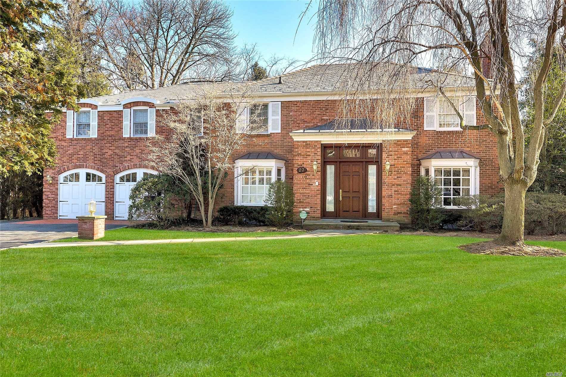 Welcome To This Stately Brick Colonial Home Situated On Approximately 1 3 Acre Of Park Like Property In The Heart Of Lake Success.