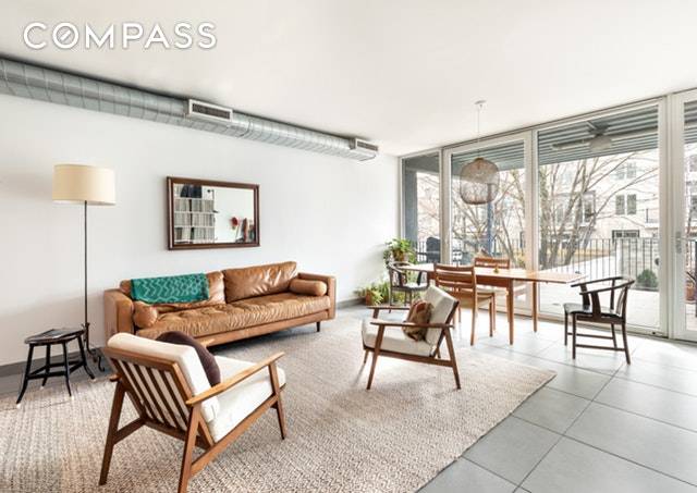 Located on the borders of Prospect Heights, Clinton Hill, and Crown Heights, this modern 2 bedroom condo is the one you have been waiting for.