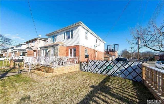 Nestled Within The Beautiful Enclave Of Ozone Park, This Extraordinary Hi Ranch Is Located At The Corner In One Of The Town's Prettiest Streets !