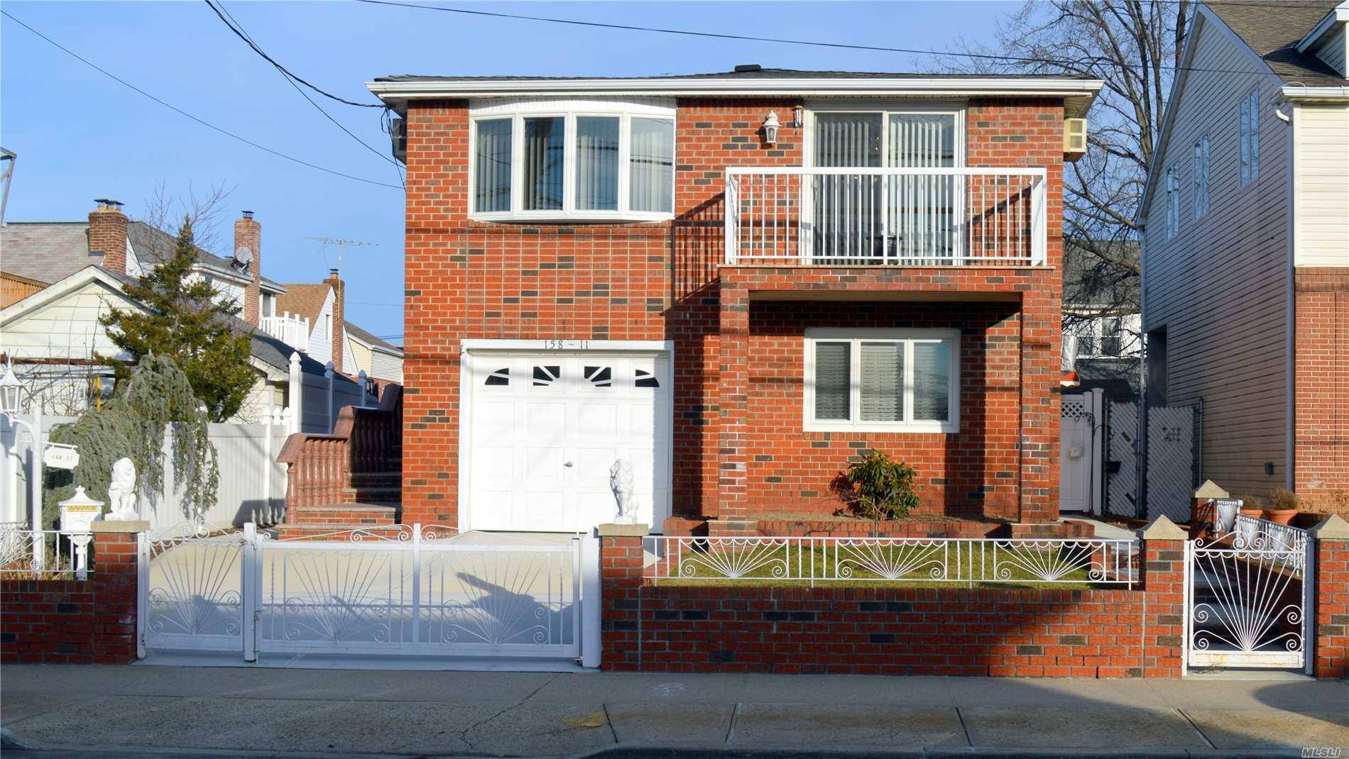 Must See ! Immaculate Brick 2 Family Built In 1982 With Brand New Granite Entrance Stairs.