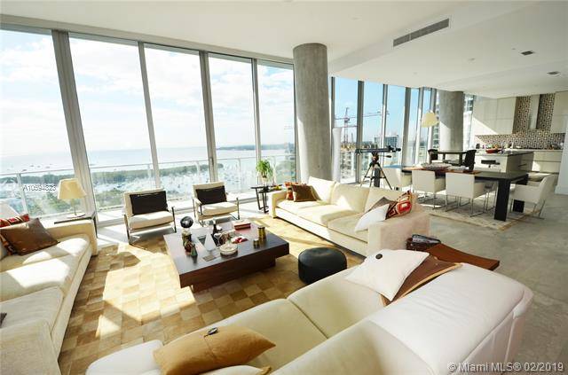 Designer-finished 4/5 dream unit on the 17th floor of 37 custom-unit South Tower of the iconic Grove at Grand Bay in Coconut Grove