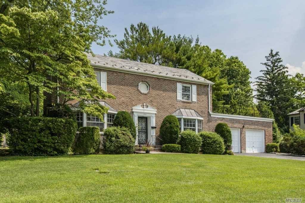 Classic, Stately Brick Center Hall Colonial On One Of Munsey Park's Most Desirable Streets.