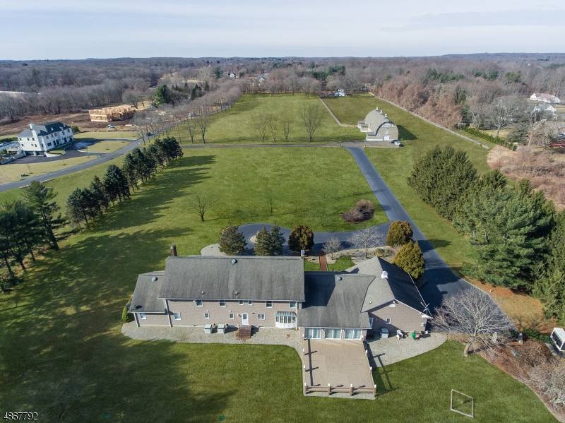 Once in a lifetime opportunity to build your dream home or renovate this custom brick front home on the most incredible property with over 29 acres of level, beautiful land.