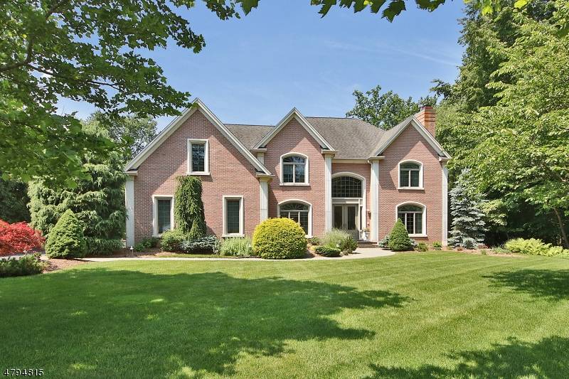 Stately all brick C H Col situated on lush professionally landscaped approx.