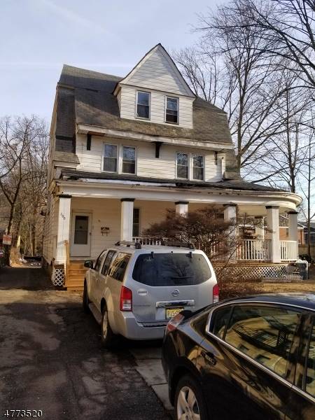 LARGE COLONIAL ON HUGE LOT, THIS HAVE A LOT OF POTENTIALS, COULD BE A BUILDERS DELIGHT.