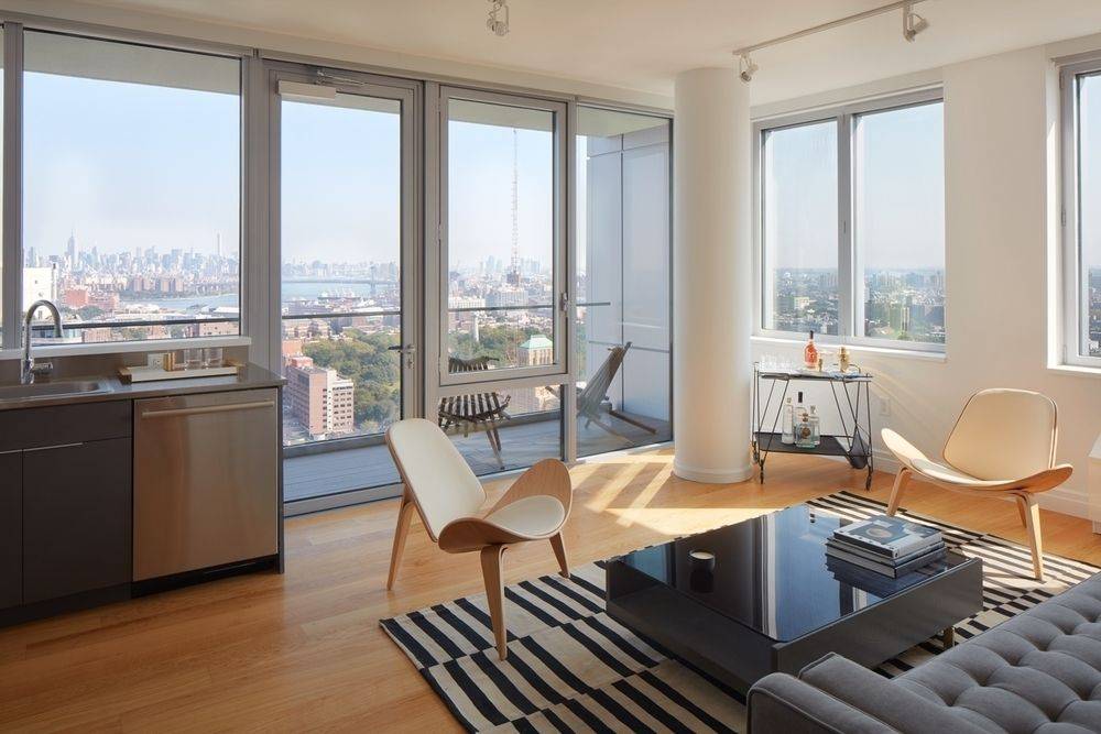 No Fee! 1 Month Free! Coveted high floor spacious corner 2BED/2BA unit offers a private balcony with floor to ceiling windows off the living room and soaring views of Brooklyn and New York Harbor!