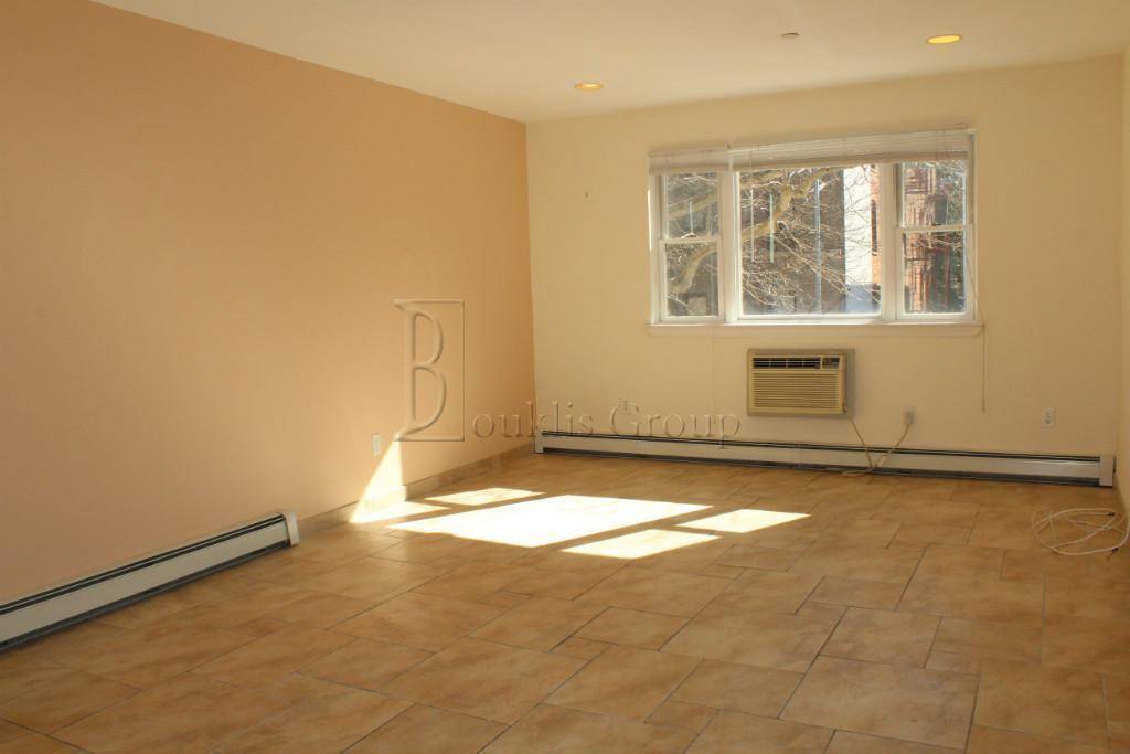 This spacious one bedroom apartment features a large open kitchen, hardwood floors, ample closet space.