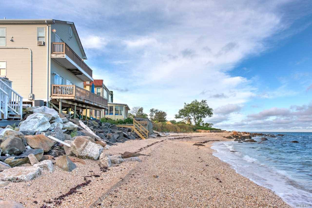 Water Front Beach House With A Contemporary Open Lay Out Featuring Breathtaking Direct Long Island Sound Water Views From Both Floors Of The Residence.