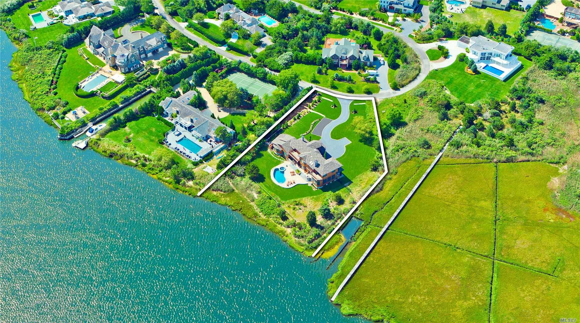 This Quality Built Home Occupies A Private, Bayfront Spot In One Of Westhampton Beach's Coveted Estate Areas Equidistant From Main Street Dune Road.