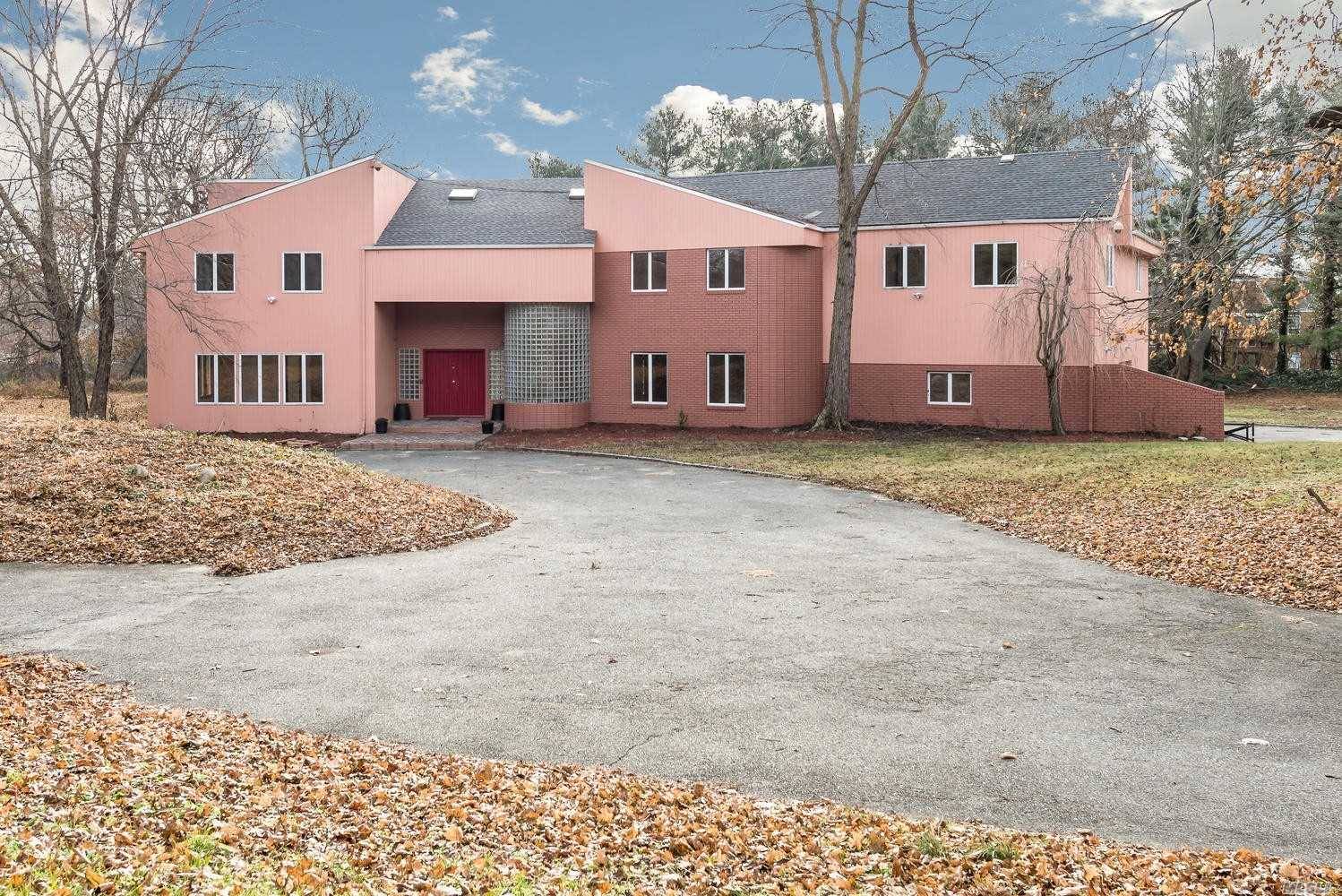 Long Driveway Leads To Private Post Modern Home In Old Westbury.