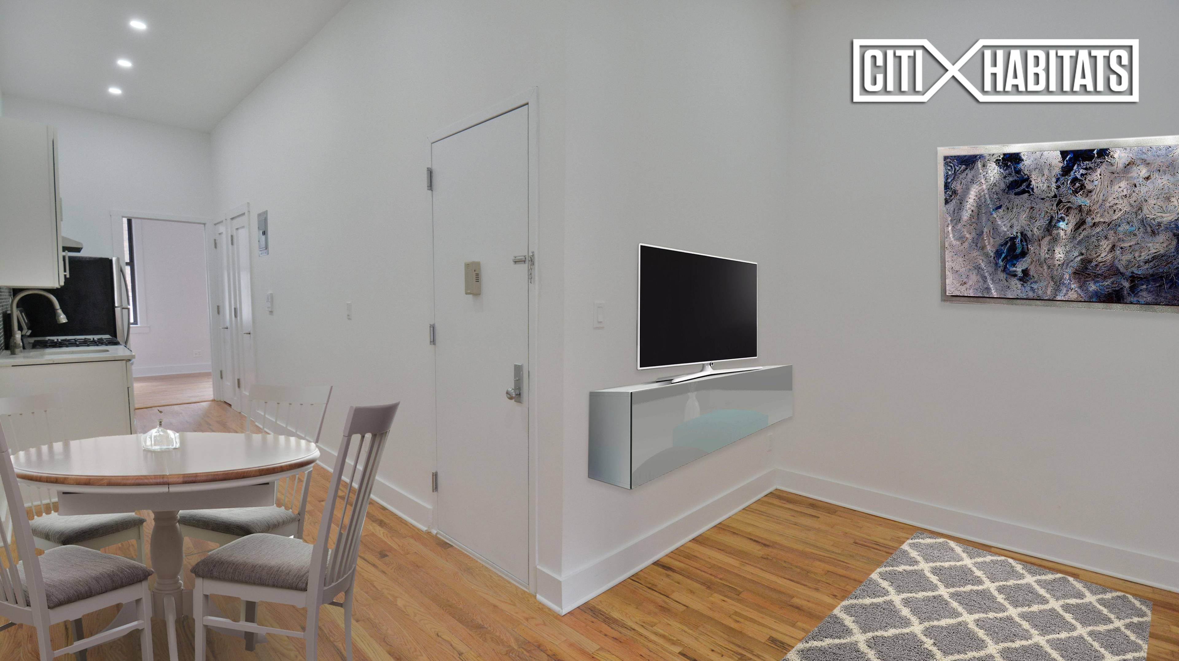 Freshly renovated garden 2 bedroom unit with high ceilings, new tiles, stainless appliances, new lighting, gleaming hardwood flooring and central location in the burgeoning new Harlem.