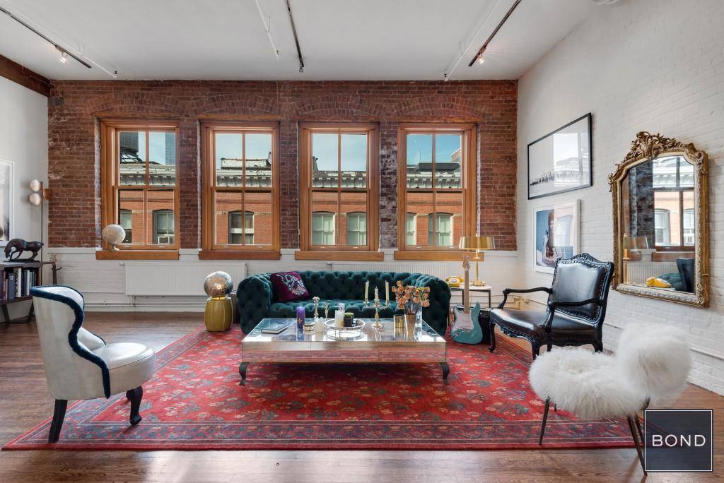 Quintessential Soho Artists loft with a private, 500sqft roof deck, available for the very first time for purchase.