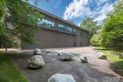 A unique opportunity to own this climate controlled modem 7500 square foot structure with residence zoning, and set on 2.