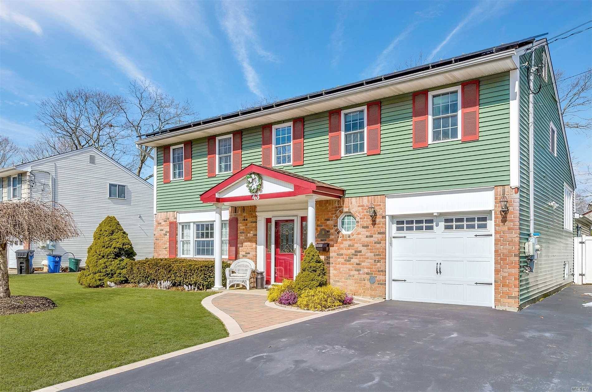 Spacious expanded Colonial Splanch on dead end street, lots of updates, 7 yr young 4 zone Buderas heating system, 18x25 Great Room Den with fireplace and full bathroom, 16x36 IG ...