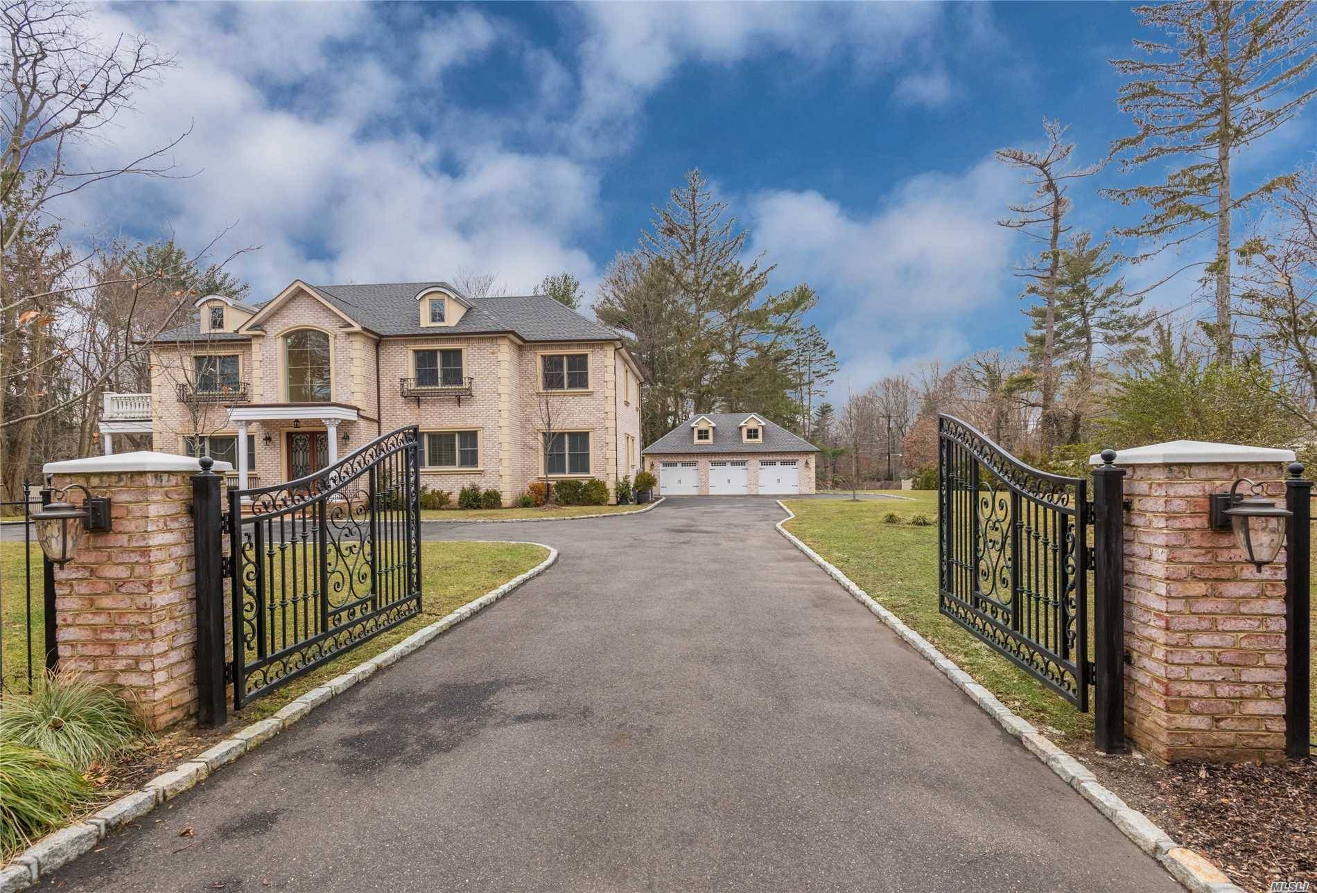 New Construction Elegant Brick Centre Hall Colonial Featuring Fine Craftsmanship And Moldings.
